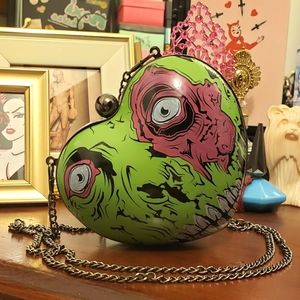 SOLD Iron First Heart Shaped Zombie Clutch